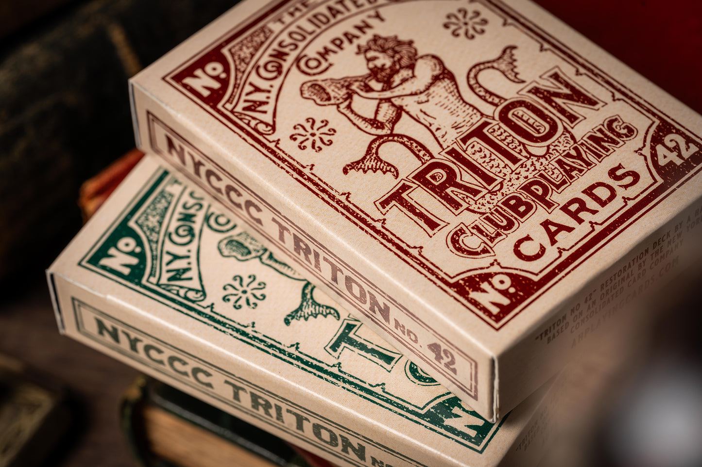 Two boxes of Treon Club Playing Cards on a dark background