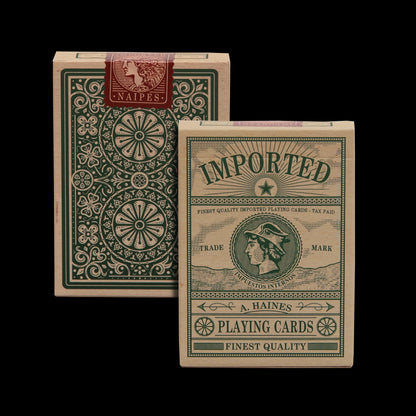 Stock photo of Imported Playing Cards deck. Showing the front and back design on this soft touch tuck box. Entire deck hand drawn with a vintage style theme through out. 