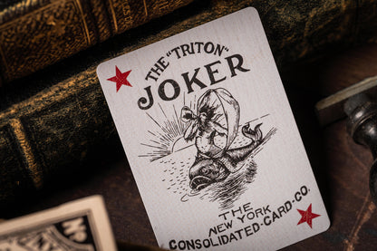 Playing card with 'The Triton Joker' design on a dark background