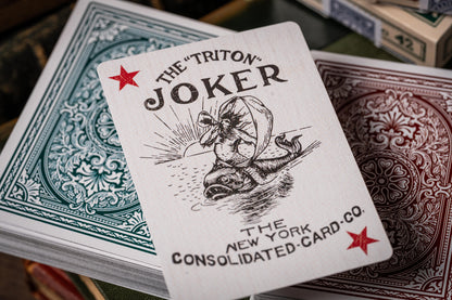 vintage Playing card with 'The Triton Joker' design and text, featuring a red star and black illustration.