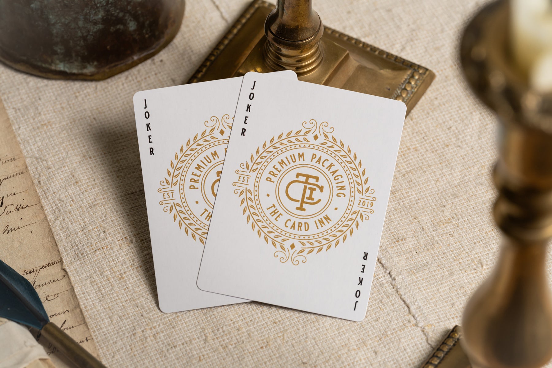 jokers | luxury the card inn clubhouse classic elegant playing cards | embossed and foiled boxes | cold foil backs | premium playing cards designed by A. Haines