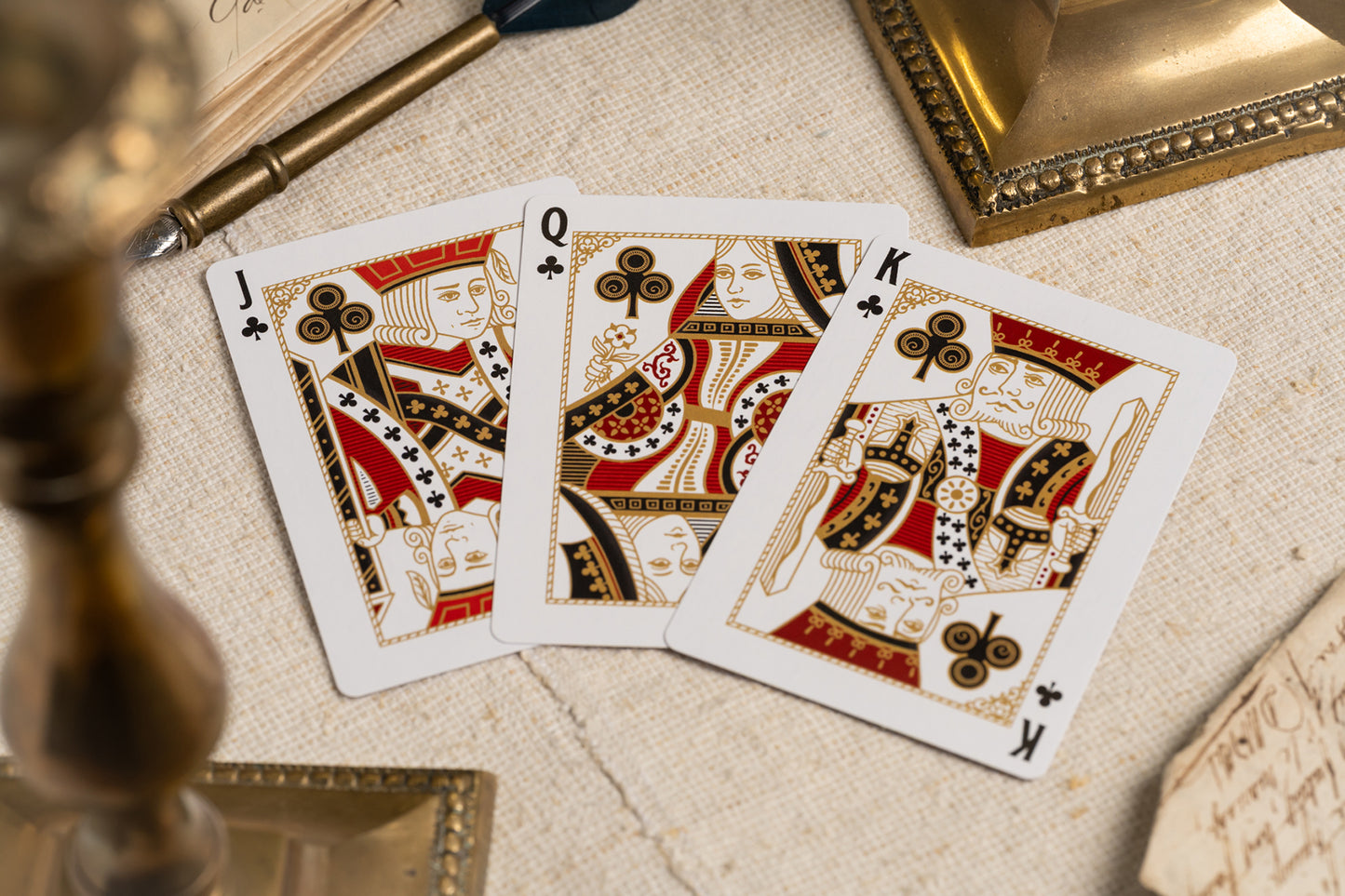 club courts | luxury the card inn clubhouse classic elegant playing cards | embossed and foiled boxes | cold foil backs | premium playing cards designed by A. Haines