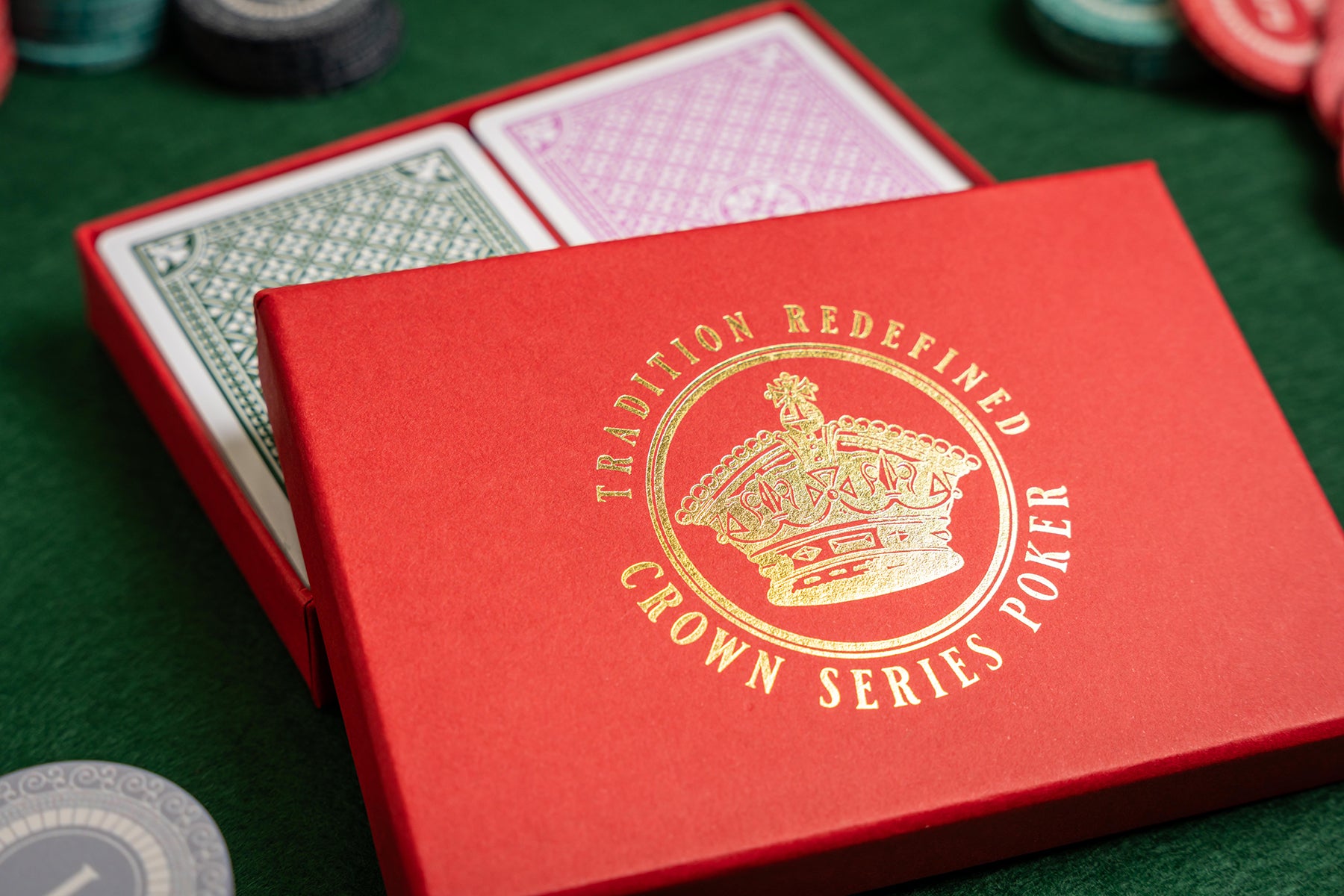 crown series poker pvc casino playing cards in luxury foiled gift box - with poker chips - close-up of luxury gift box gold foil