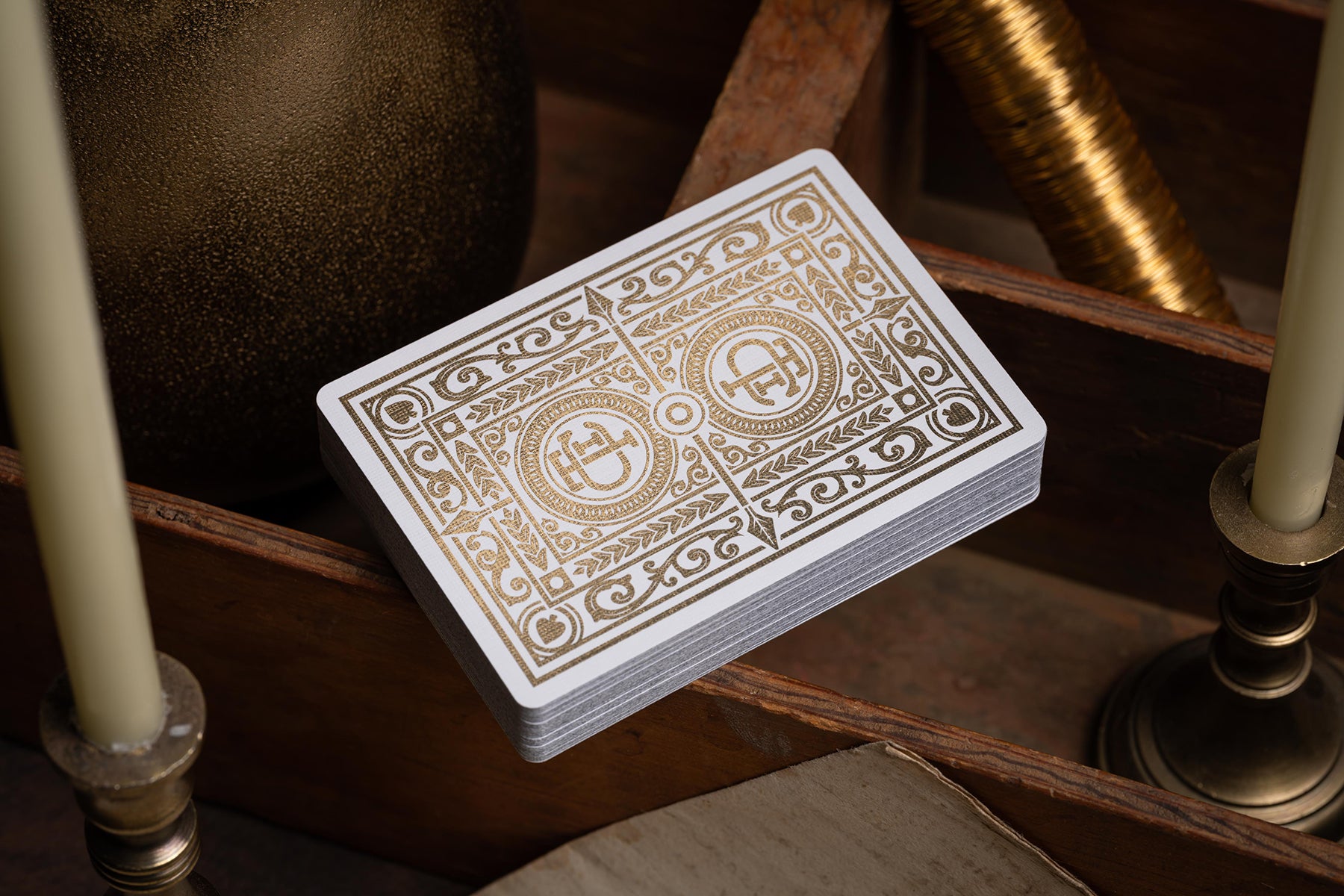 luxury the card inn clubhouse classic elegant playing cards | embossed and foiled boxes | cold foil backs | premium playing cards designed by A. Haines