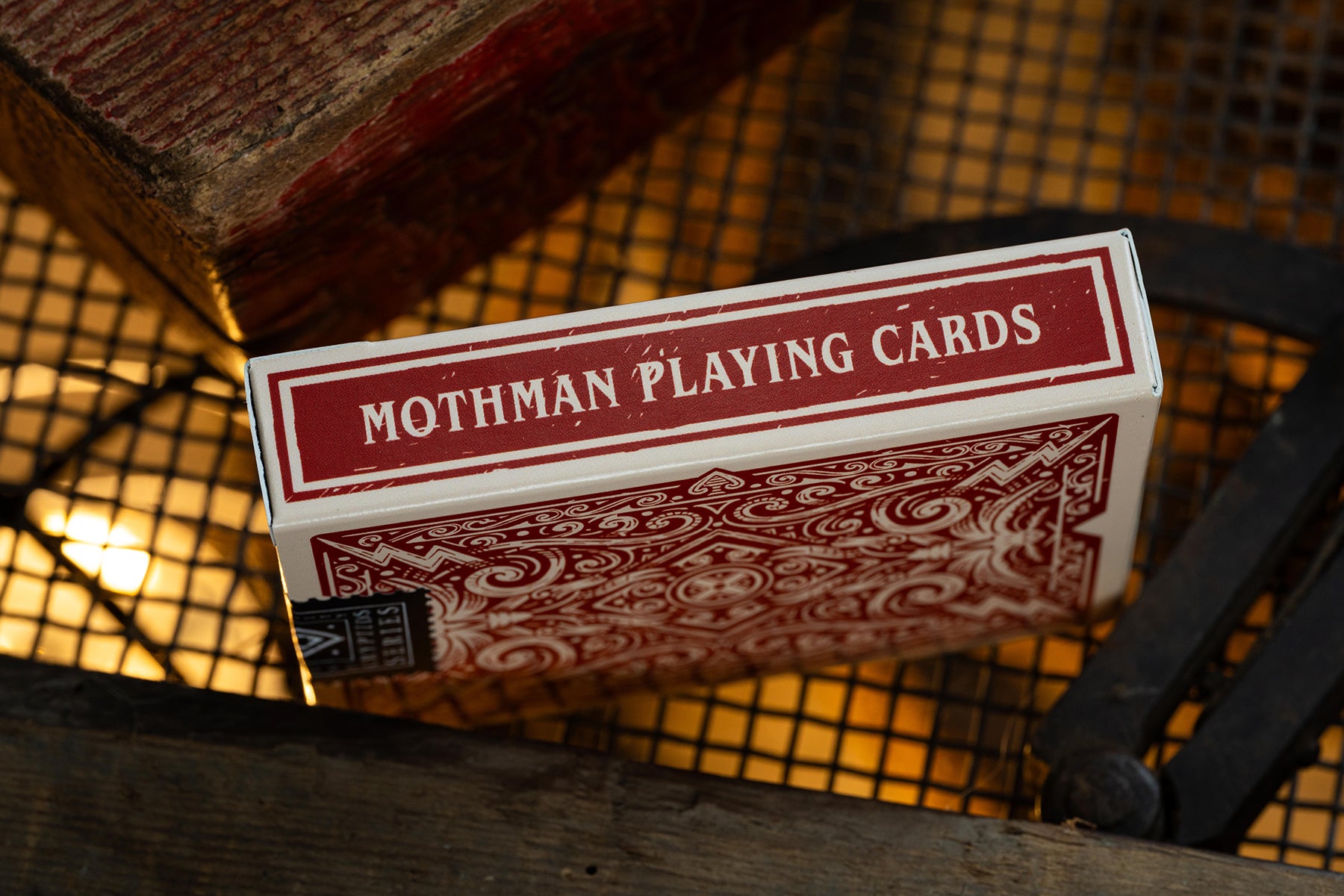 mothman vintage playing cards side tuckbox - bold red woodblock printing