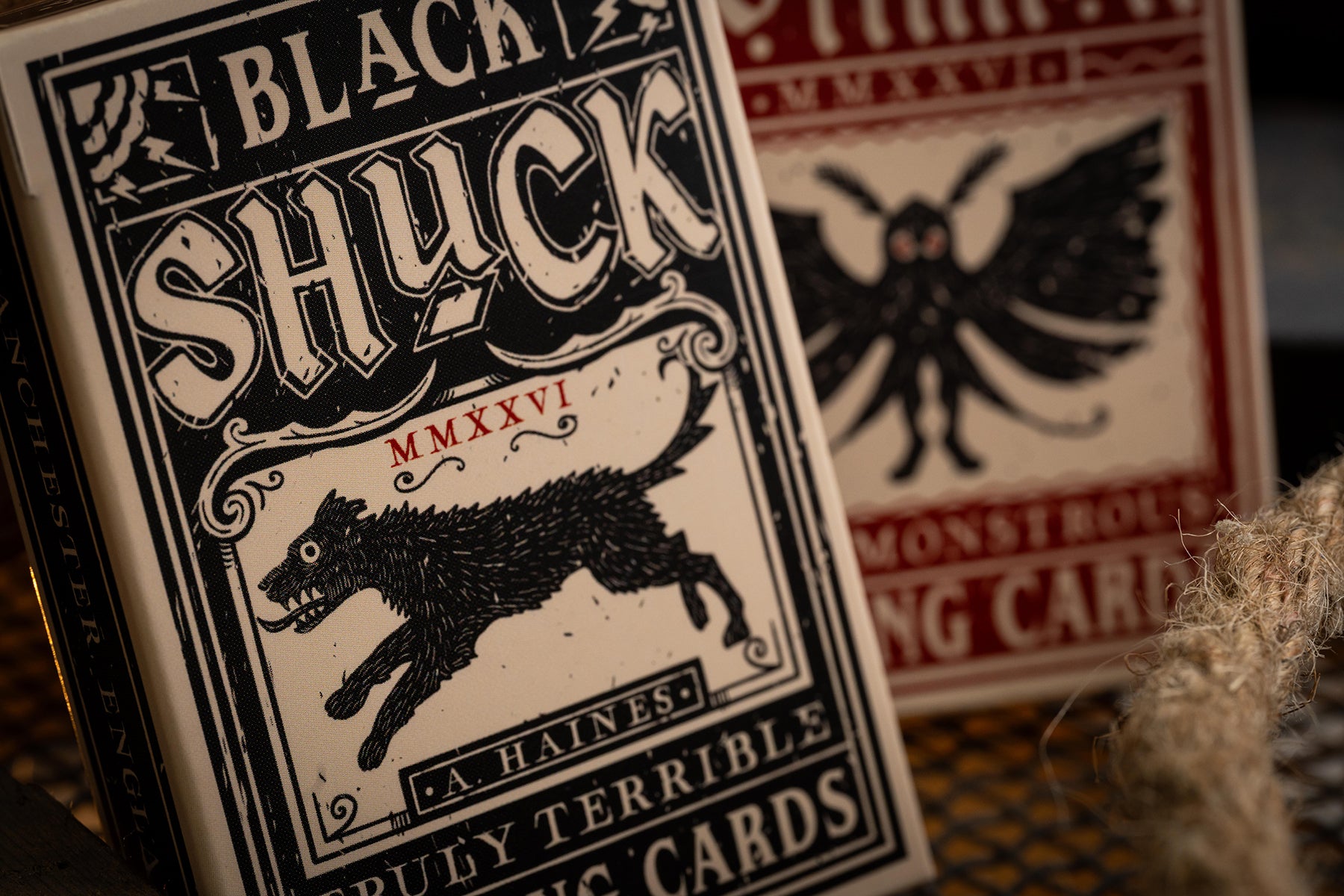 Black Shuck playing cards and mothman playing cards tuckbox artwork - vintage