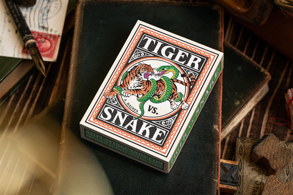 vintage matchbox artwork - tiger vs snake playing cards - tuckbox - premium playing cards