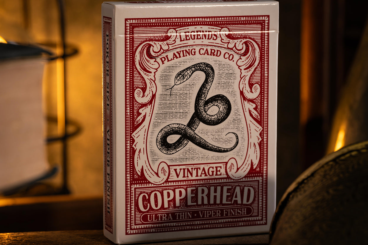 Playing card box with 'Legends Playing Card Co.' branding and 'Vintage Copperhead' text.